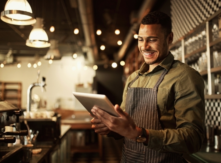 person behind bistro bar